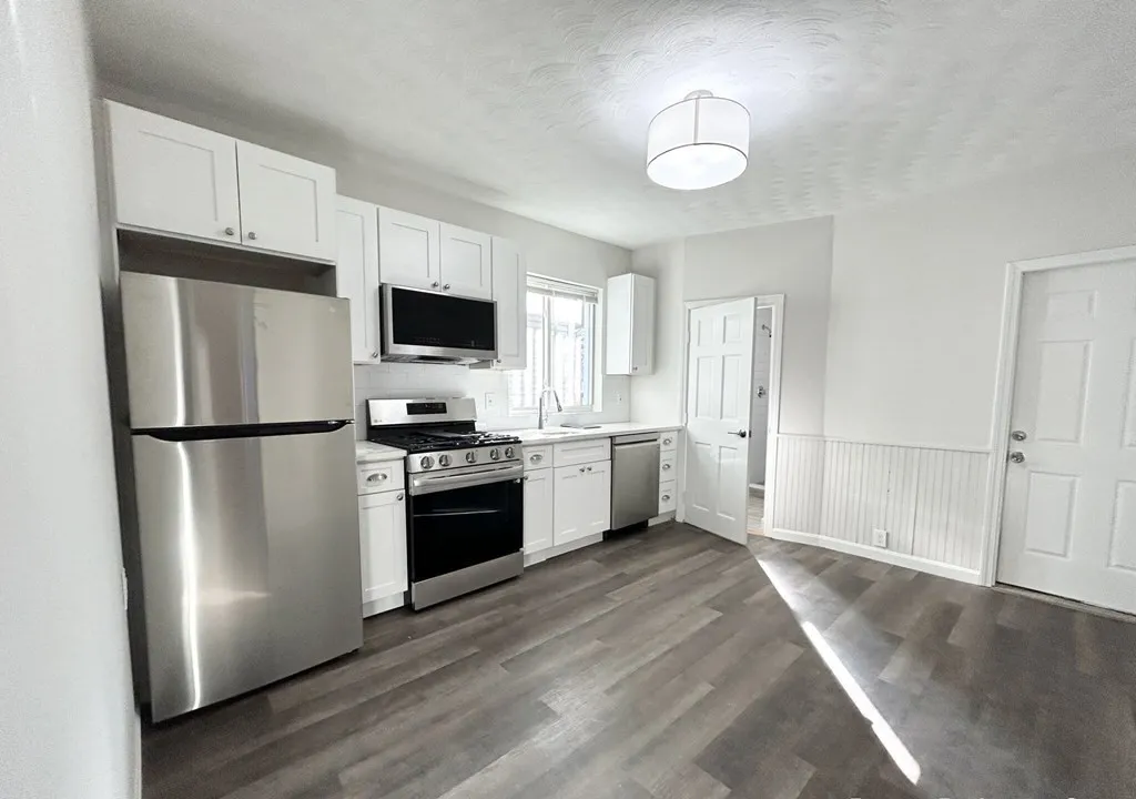 4 bed, 2 bath apartment for rent at 153 Cottage St Unit 1, Dorchester — photo 1 of 10