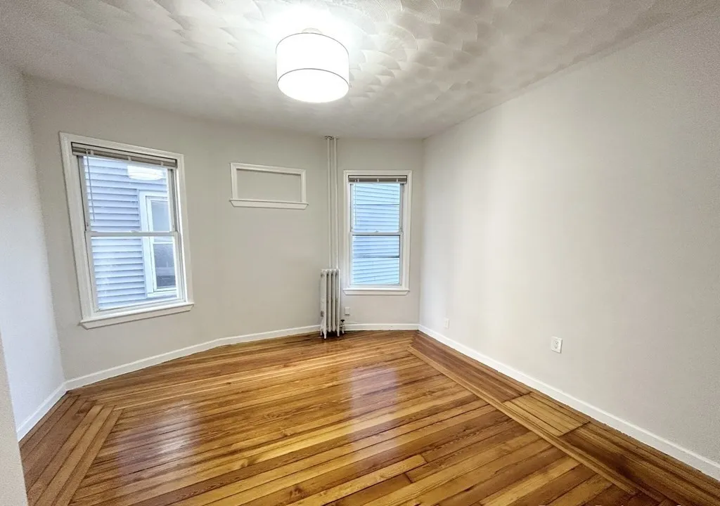 4 bed, 2 bath apartment for rent at 153 Cottage St Unit 2, Dorchester — photo 3 of 9