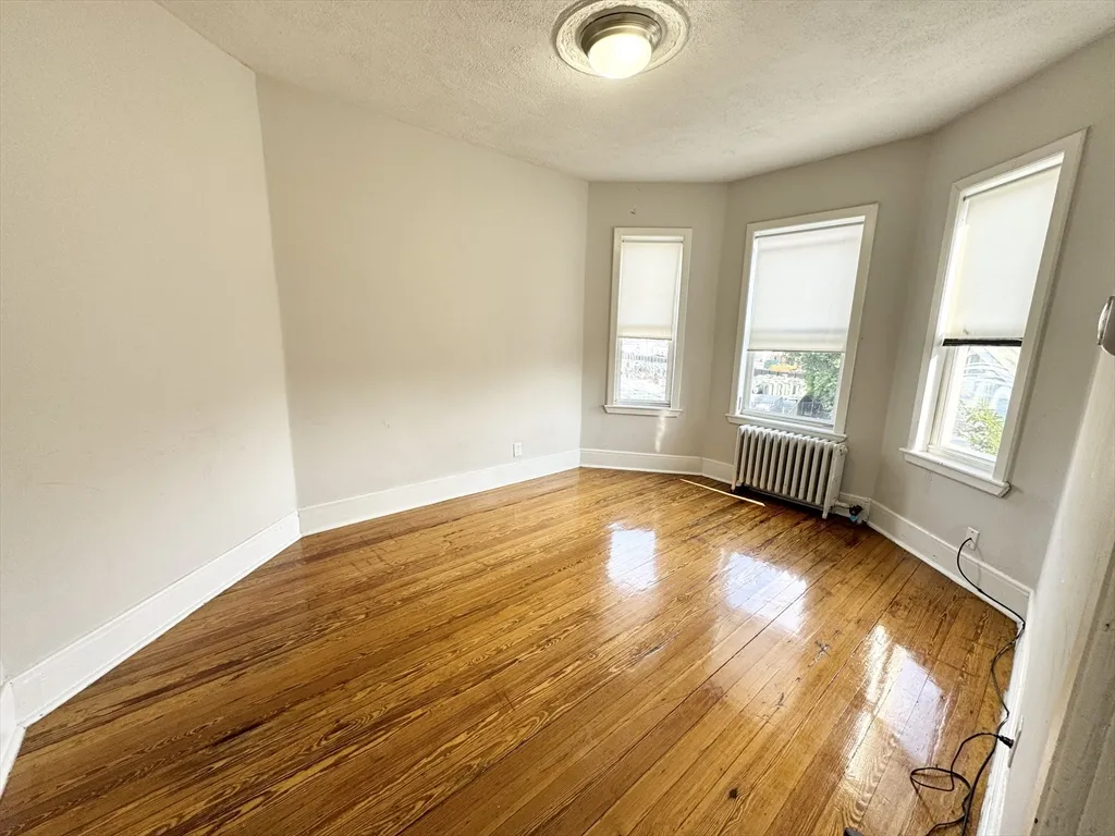 4 bed, 2 bath apartment for rent at 153 Cottage St Unit 3, Dorchester — photo 2 of 8