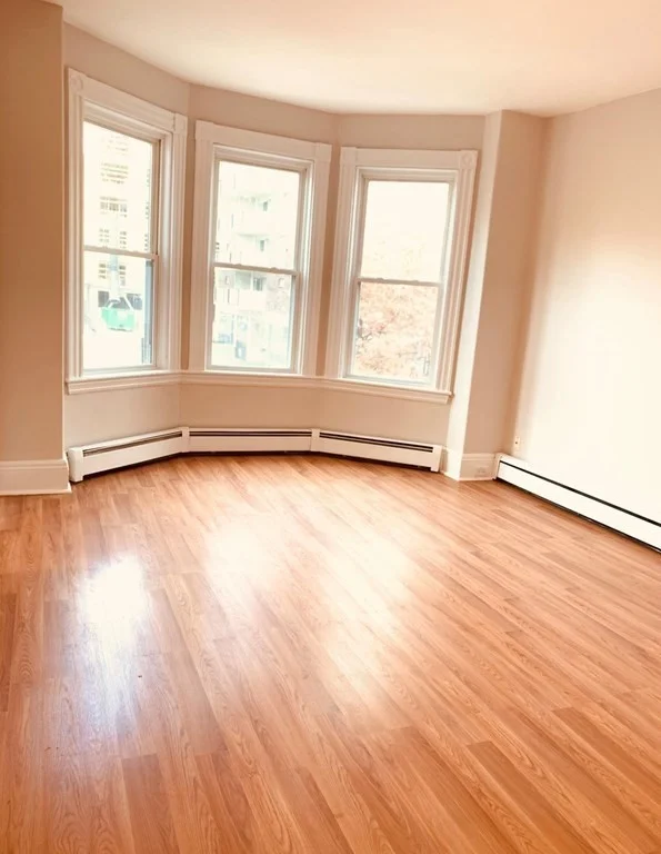 3 bed, 1 bath apartment for rent at 1574 Tremont St Unit 2, Mission Hill — photo 3 of 9