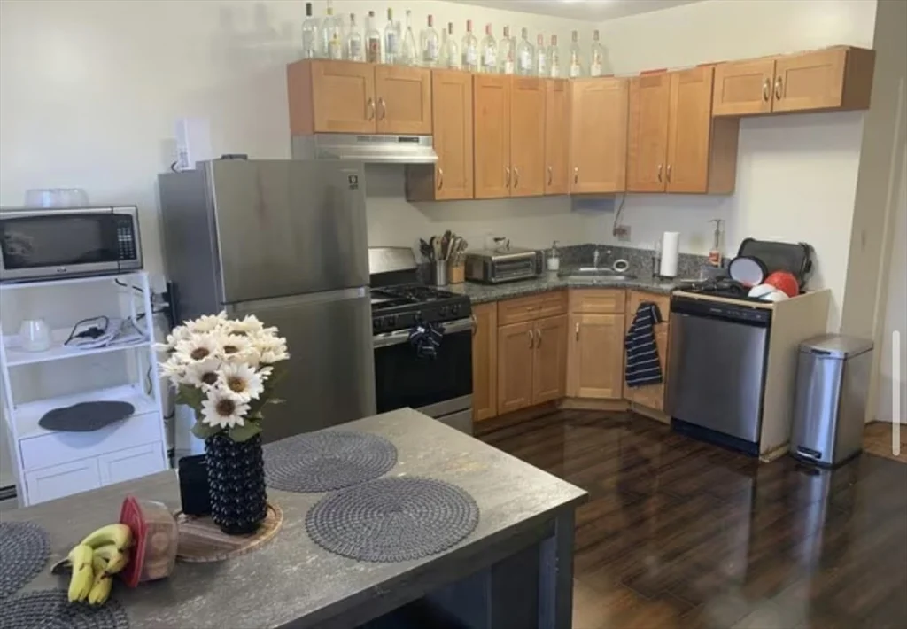3 bed, 1 bath apartment for rent at 1576 Tremont St Unit 3, Mission Hill — photo 3 of 14