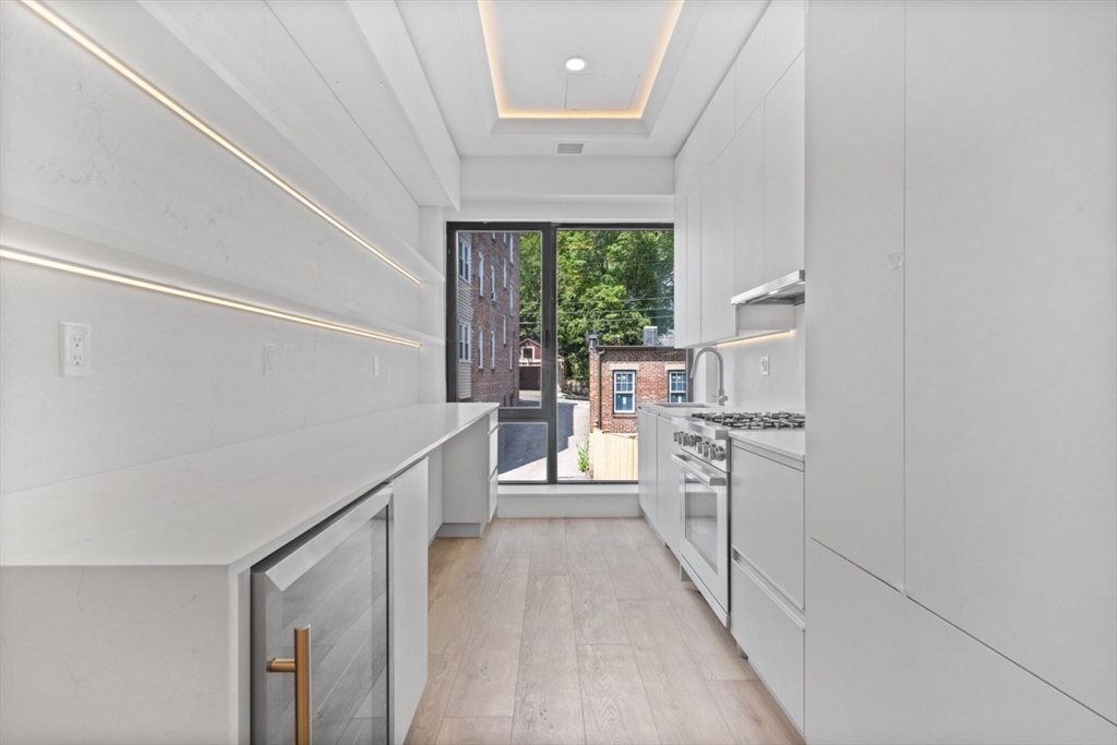4 bed, 3 bath apartment for rent at 1578 Beacon St Unit 101, Corey Hill — photo 2 of 14