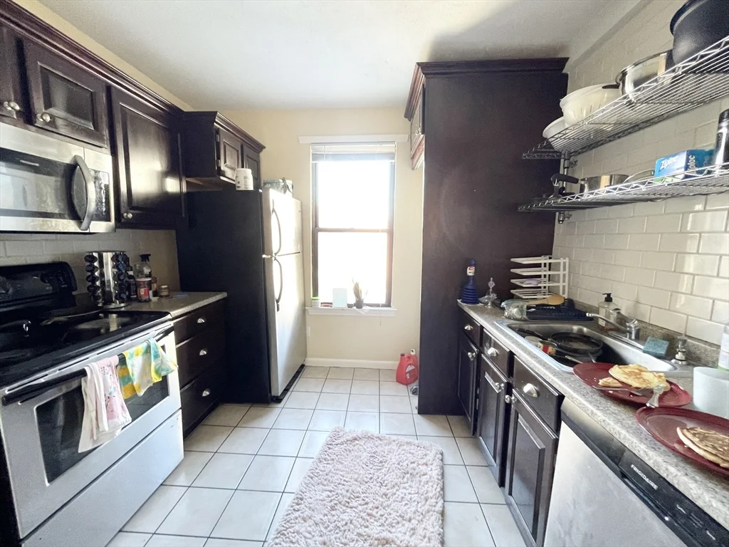 3 bed, 1 bath apartment for rent at 1578 Tremont St Unit 3, Mission Hill — photo 3 of 12