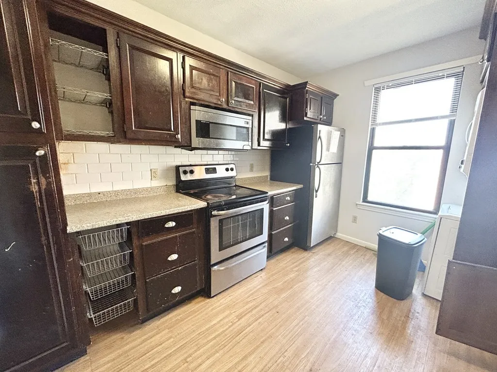 4 bed, 1 bath apartment for rent at 1578 Tremont St Unit 4, Mission Hill — photo 1 of 9