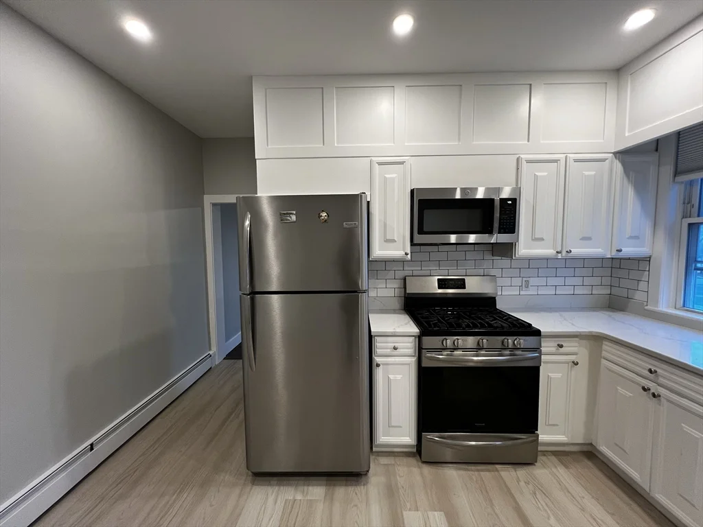 4 bed, 2 bath apartment for rent at 158 Holland Unit 1, Teele Square — photo 2 of 42