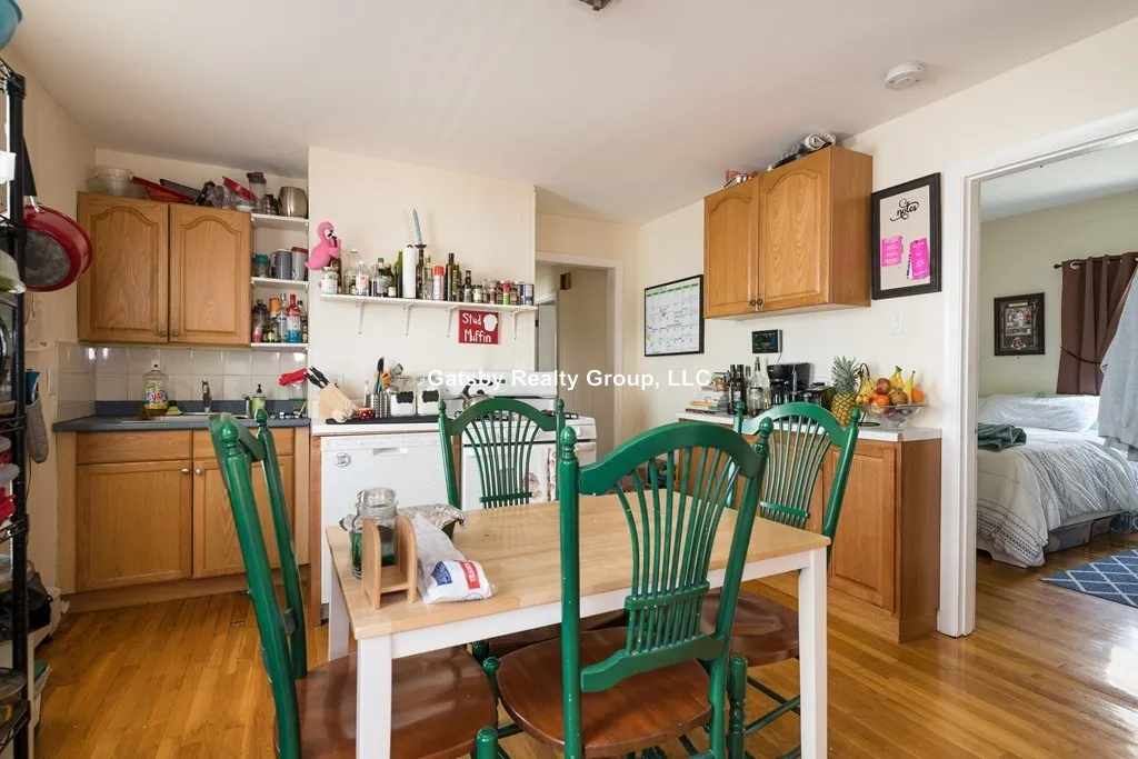 4 bed, 1.5 bath apartment for rent at 16-18 Bristol St Unit 1, Wellington-Harrington — photo 2 of 12