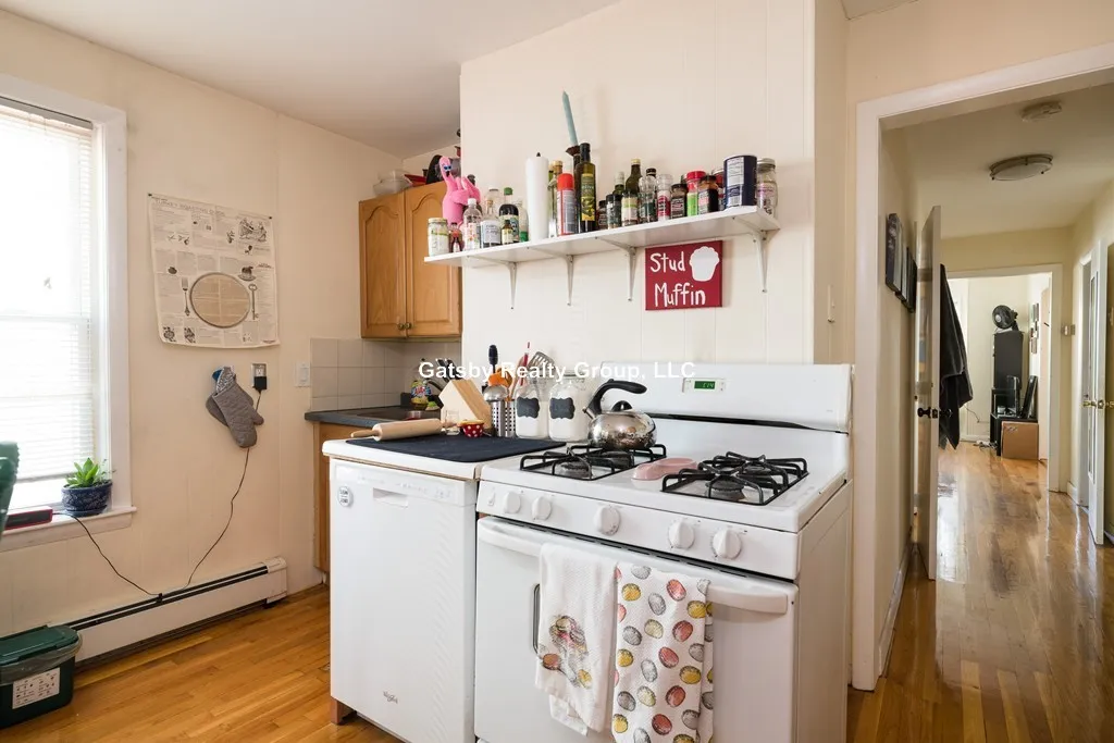 4 bed, 1.5 bath apartment for rent at 16-18 Bristol St Unit 1, Wellington-Harrington — photo 3 of 12