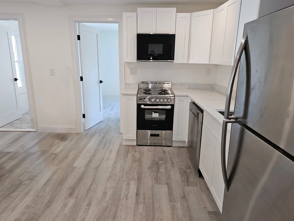 3 bed, 1 bath apartment for rent at 16 Adams St Unit 1, Hyde Park — photo 2 of 15