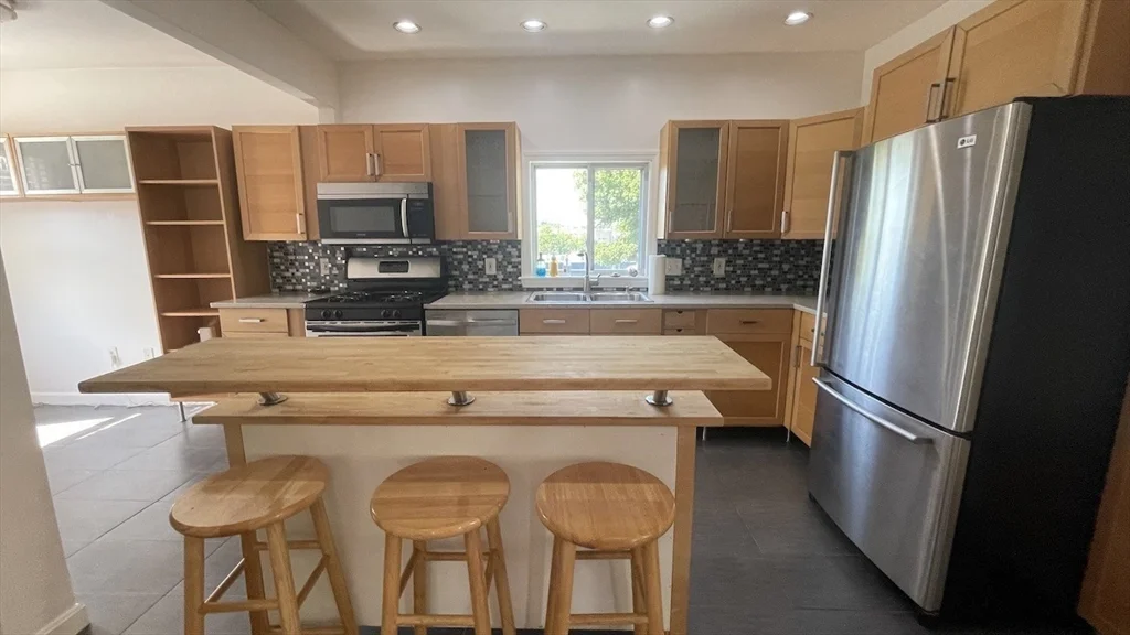 5 bed, 2 bath apartment for rent at 16 Gould Ave Unit 2, Malden — photo 1 of 22