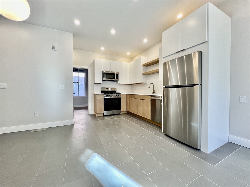 3 bed, 2 bath apartment for rent at 1607 Tremont St Unit 1, Mission Hill — photo 2 of 16