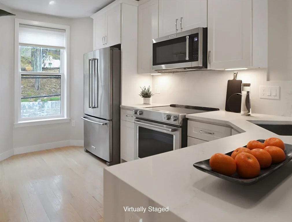2 bed, 1 bath apartment for rent at 174 Fisher Ave Unit A, Mission Hill — photo 2 of 14