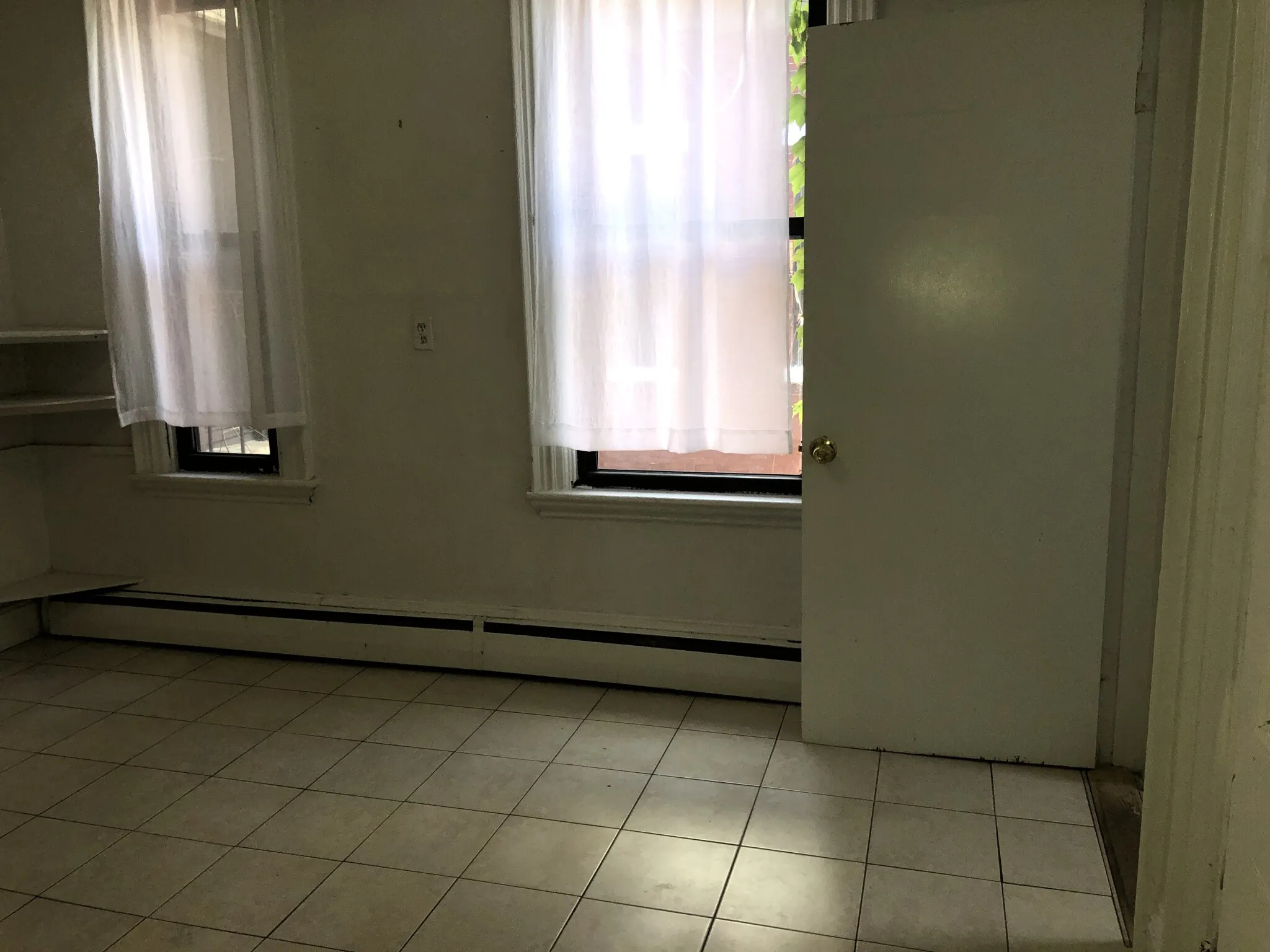 1.5 bed, 1 bath apartment for rent at 179 Harvard St Unit 179.5 - 2, The Port — photo 3 of 11