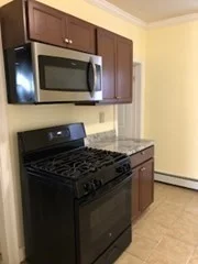 3 bed, 1 bath apartment for rent at 18 A St Unit 1, Lowell — photo 4 of 15