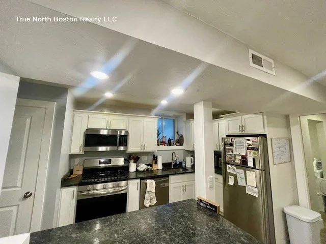5 bed, 3 bath apartment for rent at 18 Atlantic St Unit 1, South Boston — photo 1 of 14