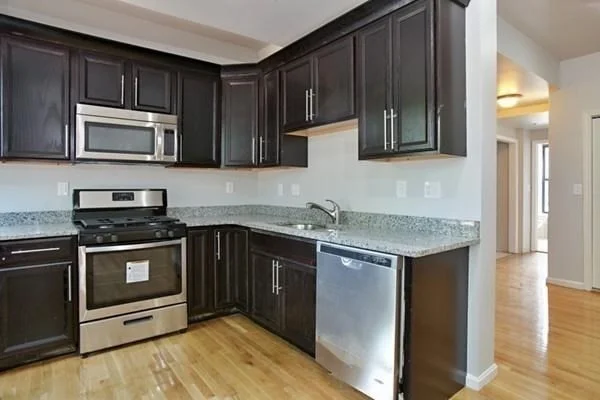 4 bed, 2 bath apartment for rent at 18 Perrin St Unit 2, Roxbury — photo 2 of 9