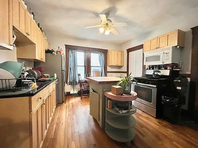 4 bed, 1 bath apartment for rent at 18 Sachem St, Mission Hill — photo 1 of 16