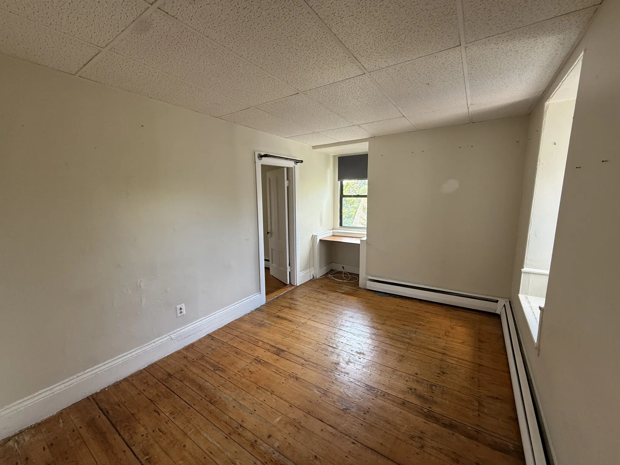 3 bed, 1 bath apartment for rent at 183 Harvard St Unit 3, The Port — photo 4 of 10