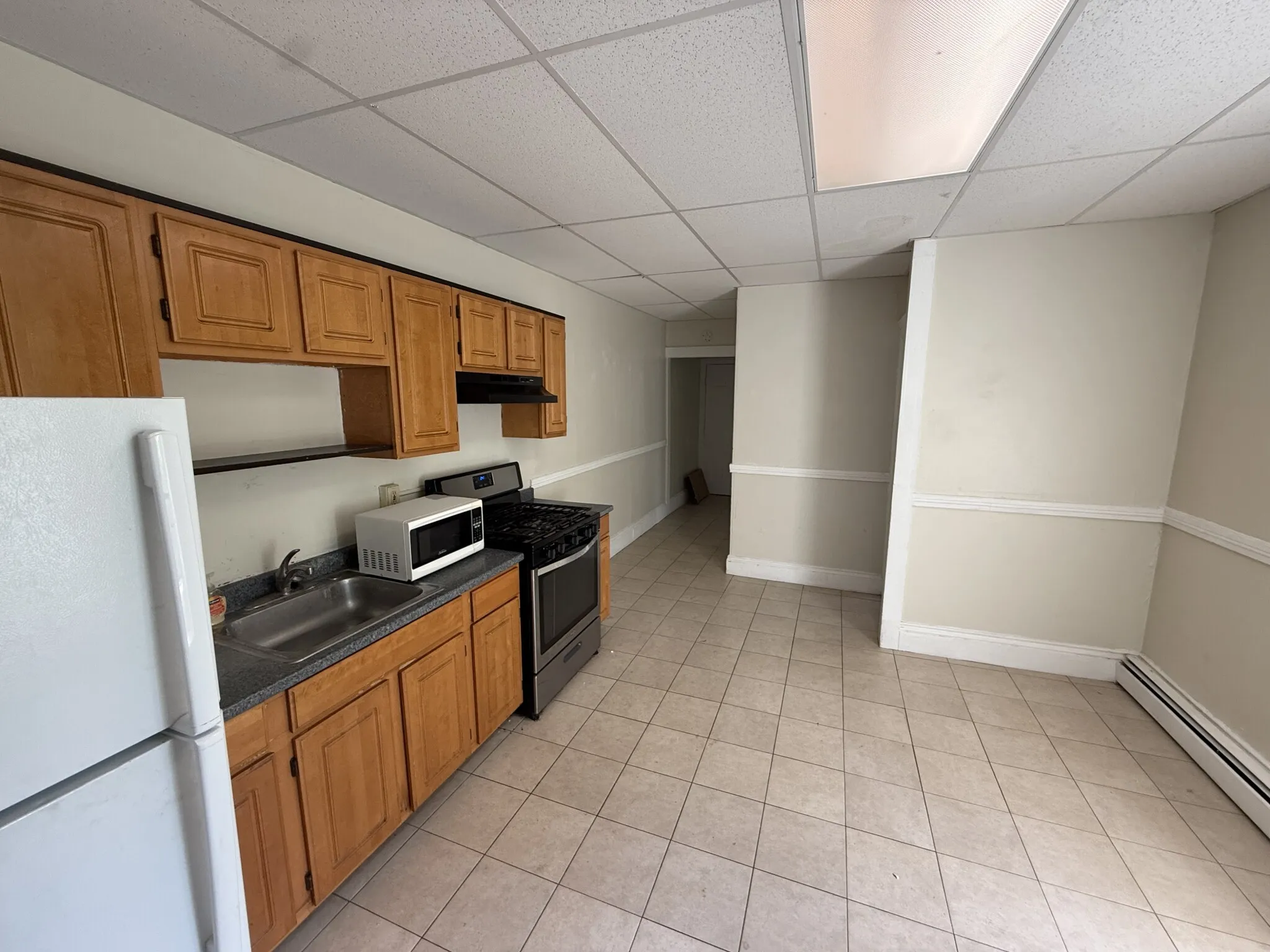 3 bed, 1 bath apartment for rent at 183 Harvard St Unit 3, The Port — photo 2 of 10