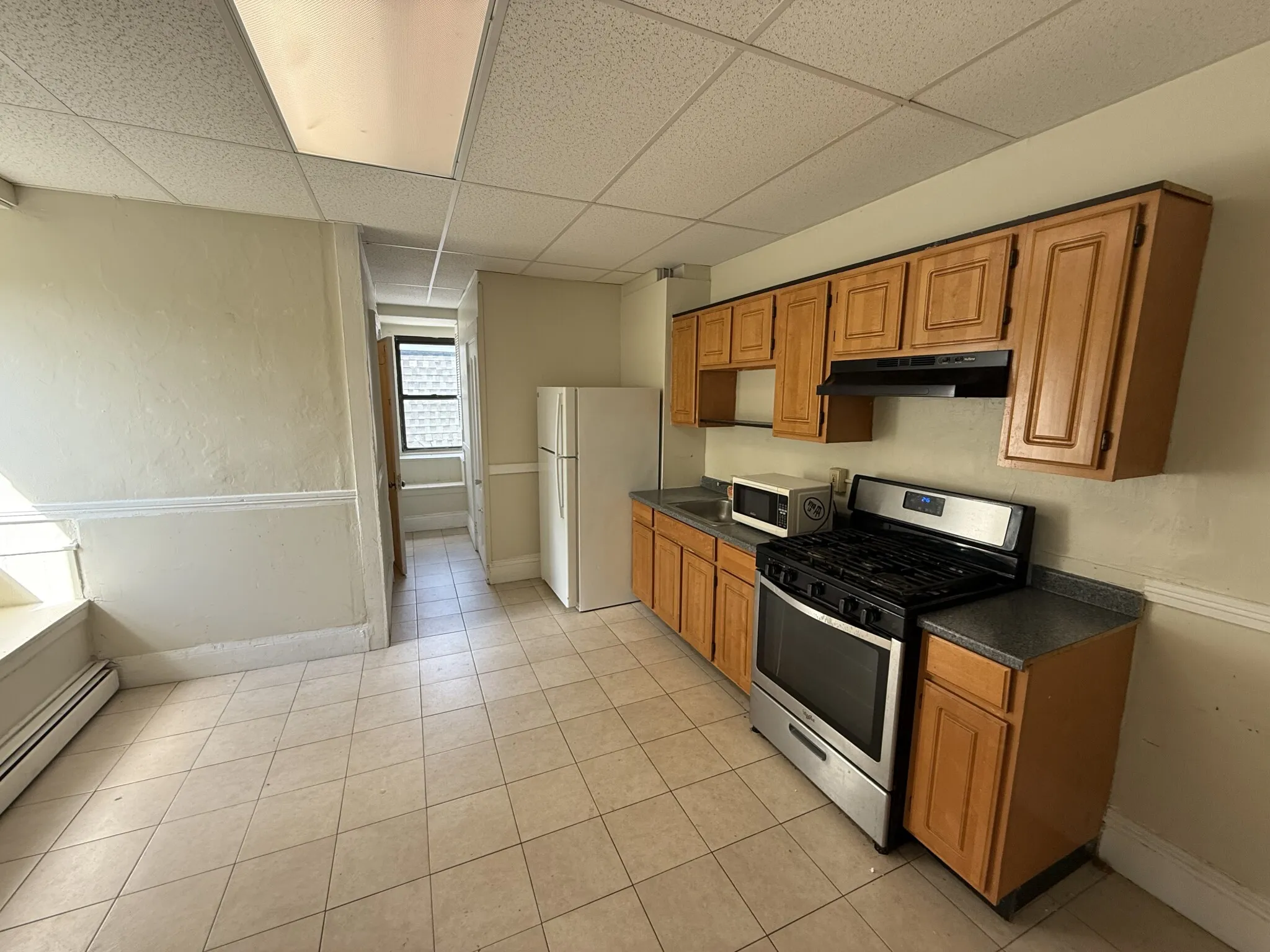 3 bed, 1 bath apartment for rent at 183 Harvard St Unit 3, The Port — photo 1 of 10