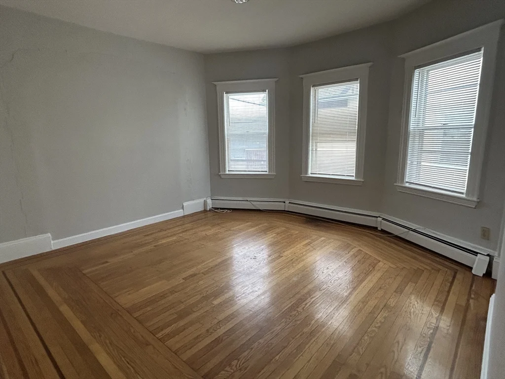 3 bed, 1 bath apartment for rent at 19 Pearl St Unit 2, Malden — photo 4 of 6