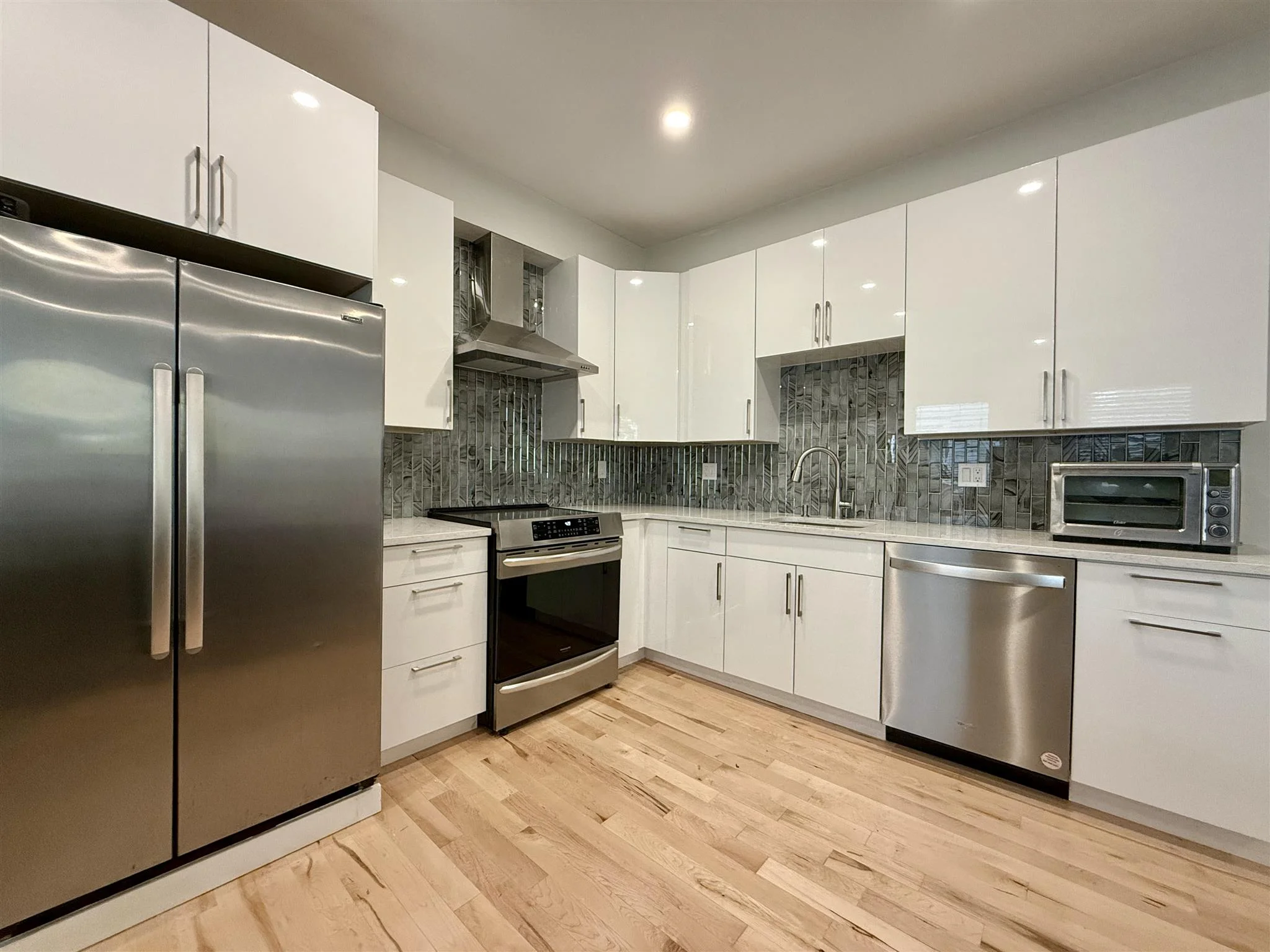 2 bed, 1.5 bath apartment for rent at 19 Gorham St Unit 1, Teele Square — photo 1 of 17