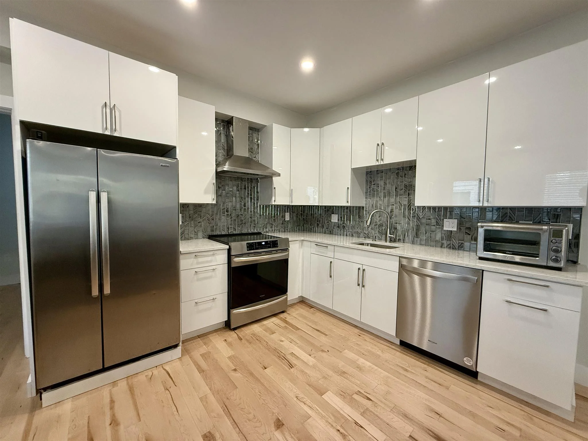 2 bed, 1.5 bath apartment for rent at 19 Gorham St Unit 1, Teele Square — photo 2 of 17