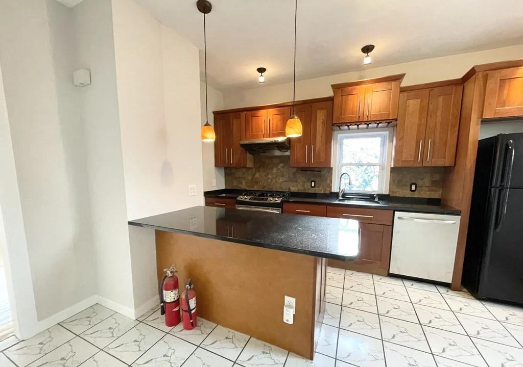 5 bed, 2 bath apartment for rent at 19 Locust Unit Street, Dorchester — photo 1 of 15