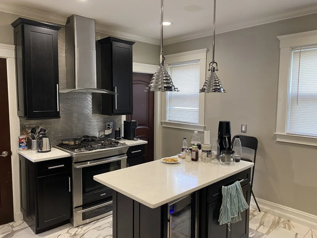 4 bed, 1 bath apartment for rent at 19 Pleasant St Unit 1, Dorchester — photo 1 of 10