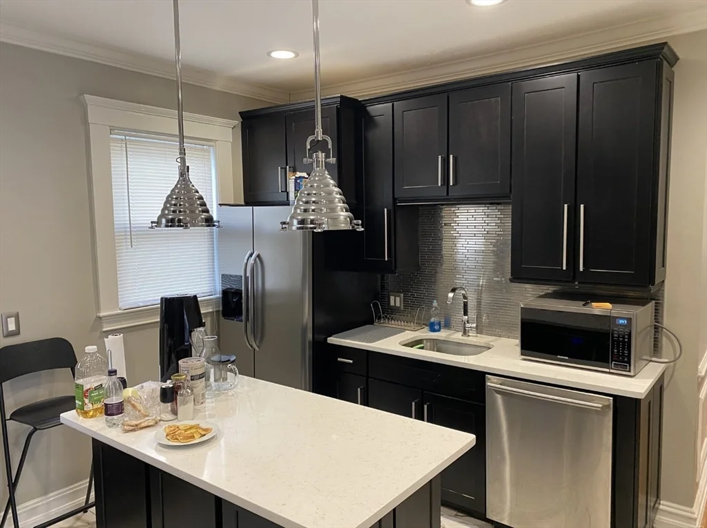 4 bed, 1 bath apartment for rent at 19 Pleasant St Unit 1, Dorchester — photo 2 of 10