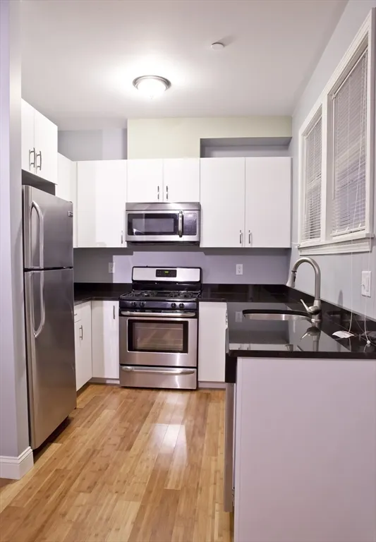 4 bed, 2 bath apartment for rent at 195 W Third Unit 4, South Boston — photo 1 of 16