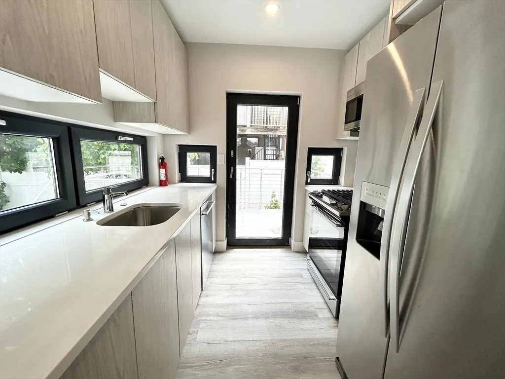 5 bed, 3 bath apartment for rent at 2 West 3rd Unit Rear, South Boston — photo 1 of 12
