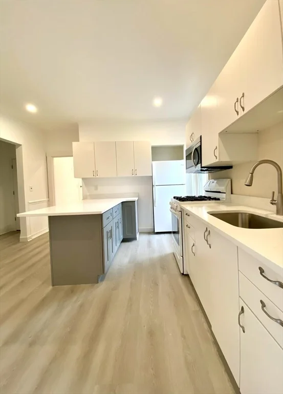 4 bed, 2 bath apartment for rent at 20 Howard St Unit 2, Waltham — photo 2 of 14