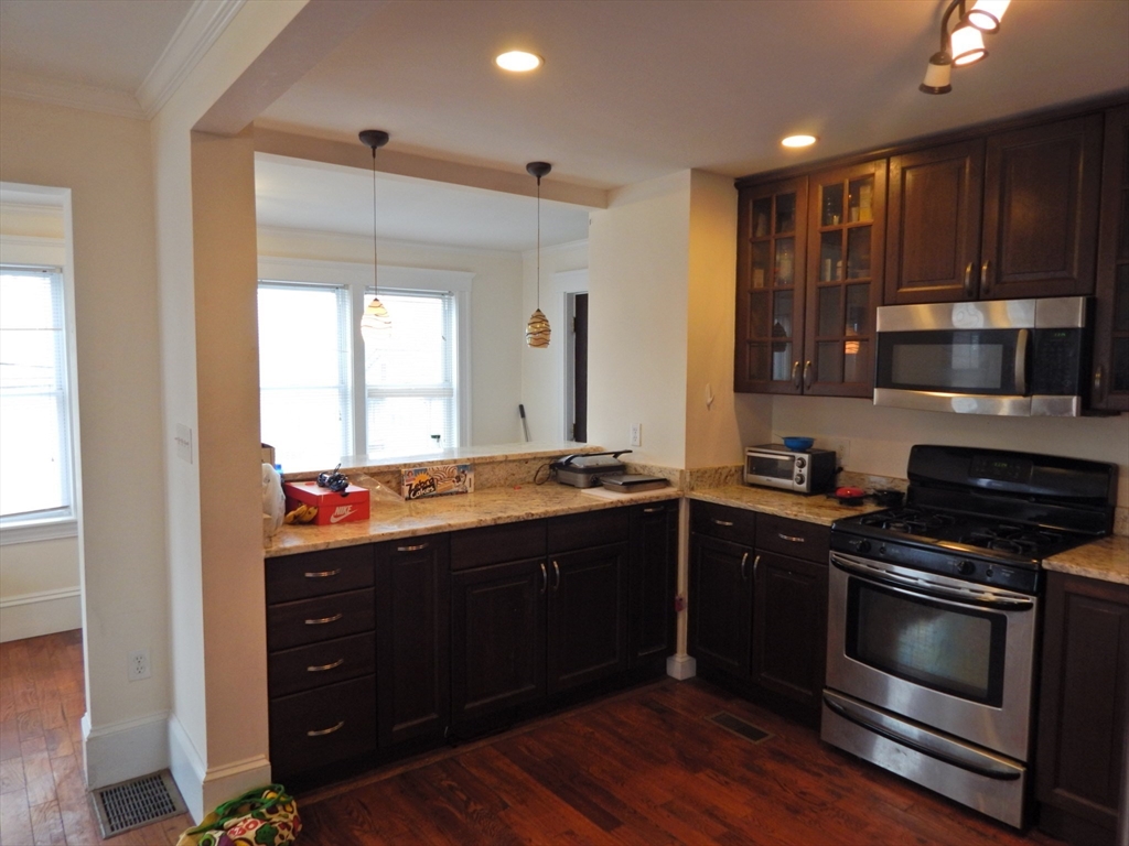6 bed, 3 bath apartment for rent at 20 Stockwell St Unit 20, Mission Hill — photo 2 of 11