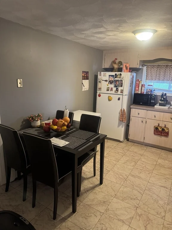3 bed, 1 bath apartment for rent at 21 Cook Unit 1, Chelsea — photo 2 of 32