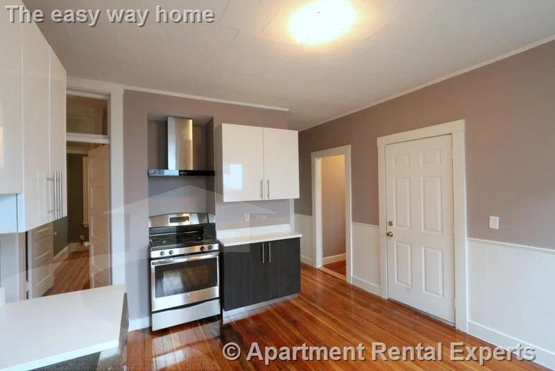 4 bed, 1 bath apartment for rent at 21 Granite St Unit 2, Union Square — photo 3 of 15