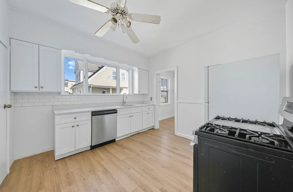 5 bed, 2 bath apartment for rent at 21 Wolcott St Unit 21, Malden — photo 5 of 16