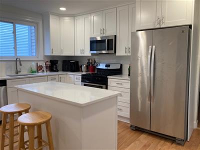 7 bed, 2 bath apartment for rent at 212 Norfolk St Unit 1, The Port — photo 4 of 21