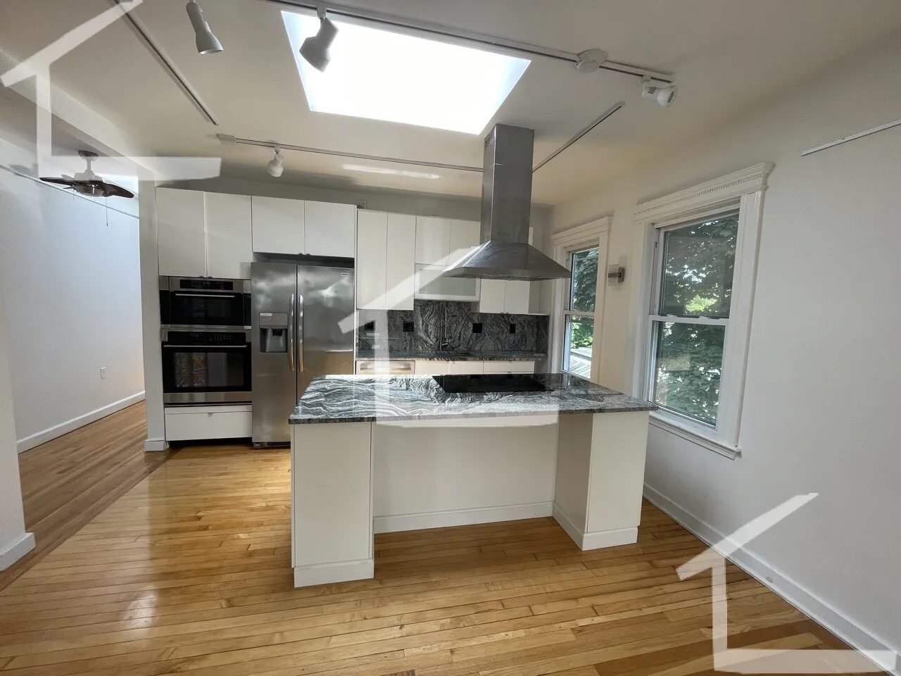 3 bed, 2 bath apartment for rent at 229 Harvard St Unit 6, The Port — photo 1 of 21