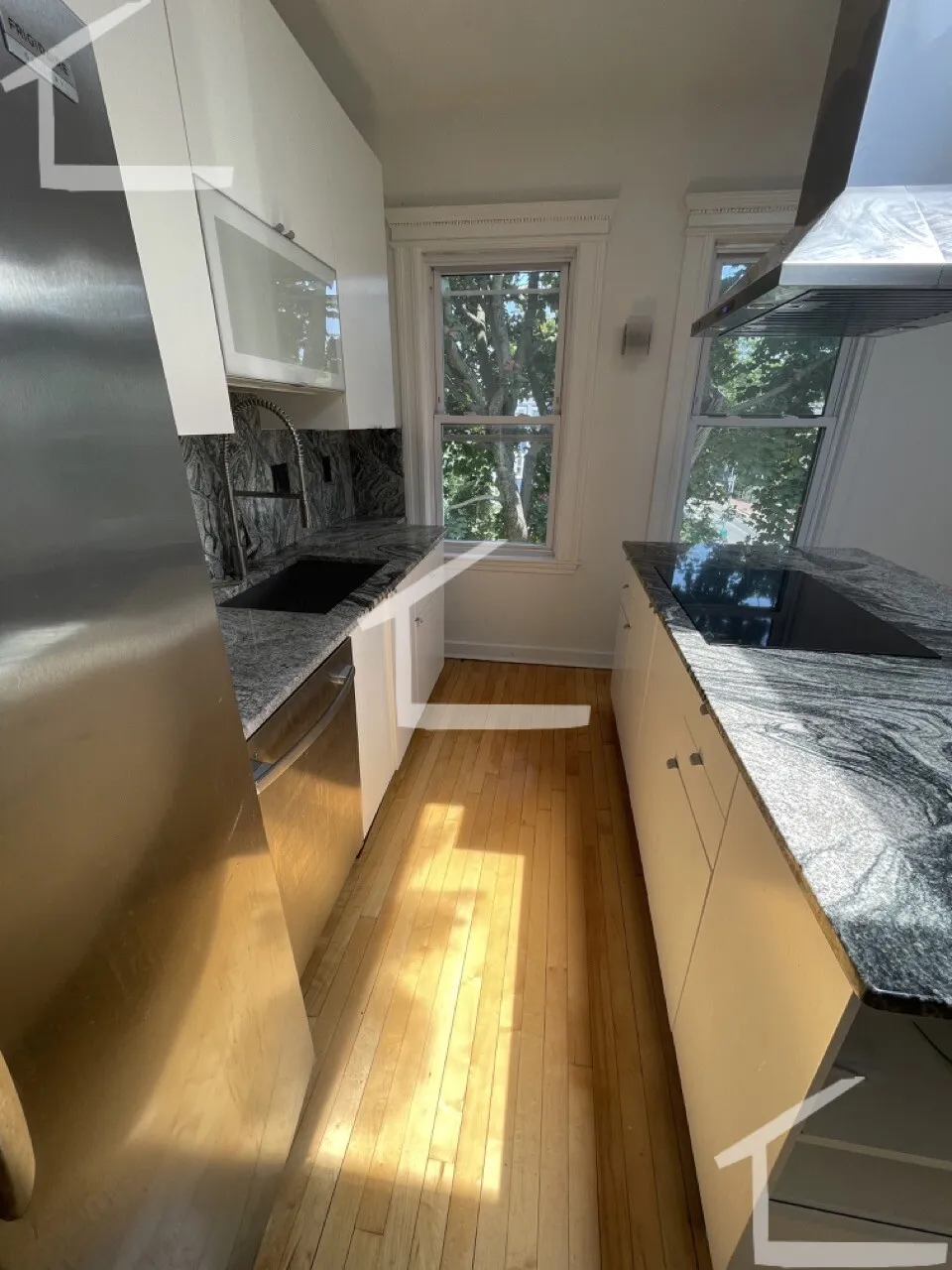 3 bed, 2 bath apartment for rent at 229 Harvard St Unit 6, The Port — photo 5 of 21