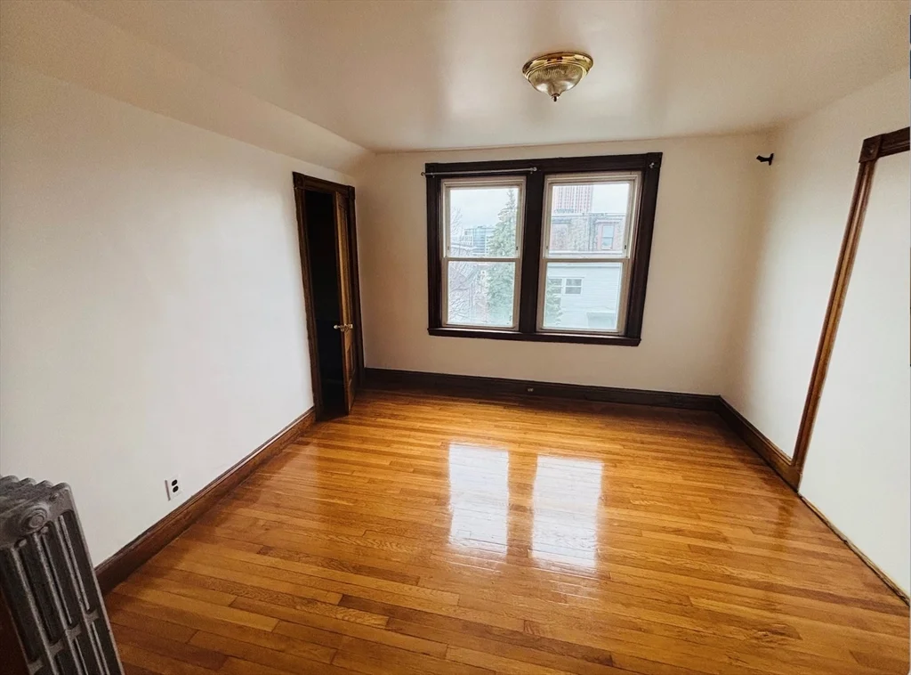 3 bed, 1 bath apartment for rent at 23 Munroe St Unit 2, Union Square — photo 3 of 19