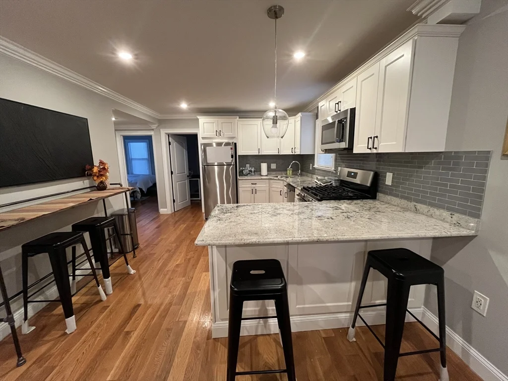 3 bed, 1 bath apartment for rent at 23 Rockledge St Unit 1, Roxbury — photo 2 of 11
