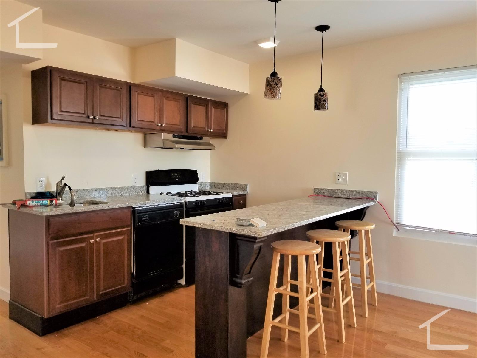 4 bed, 2 bath apartment for rent at 23 Weitz St Unit 1, Lower Allston — photo 2 of 11