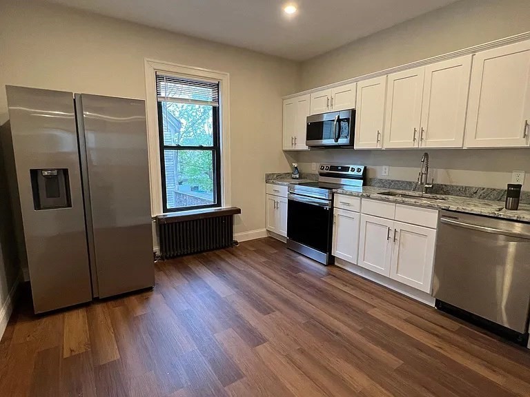 5 bed, 2 bath apartment for rent at 23 Woodville St, Roxbury — photo 3 of 27