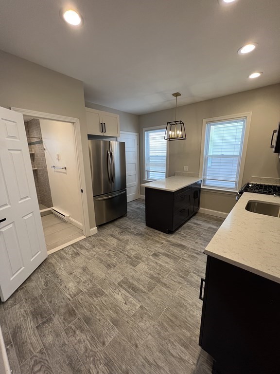 3 bed, 2 bath apartment for rent at 24 Buttonwood St Unit 2, Dorchester — photo 2 of 11