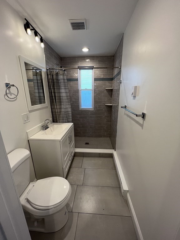 3 bed, 2 bath apartment for rent at 24 Buttonwood St Unit 2, Dorchester — photo 5 of 11