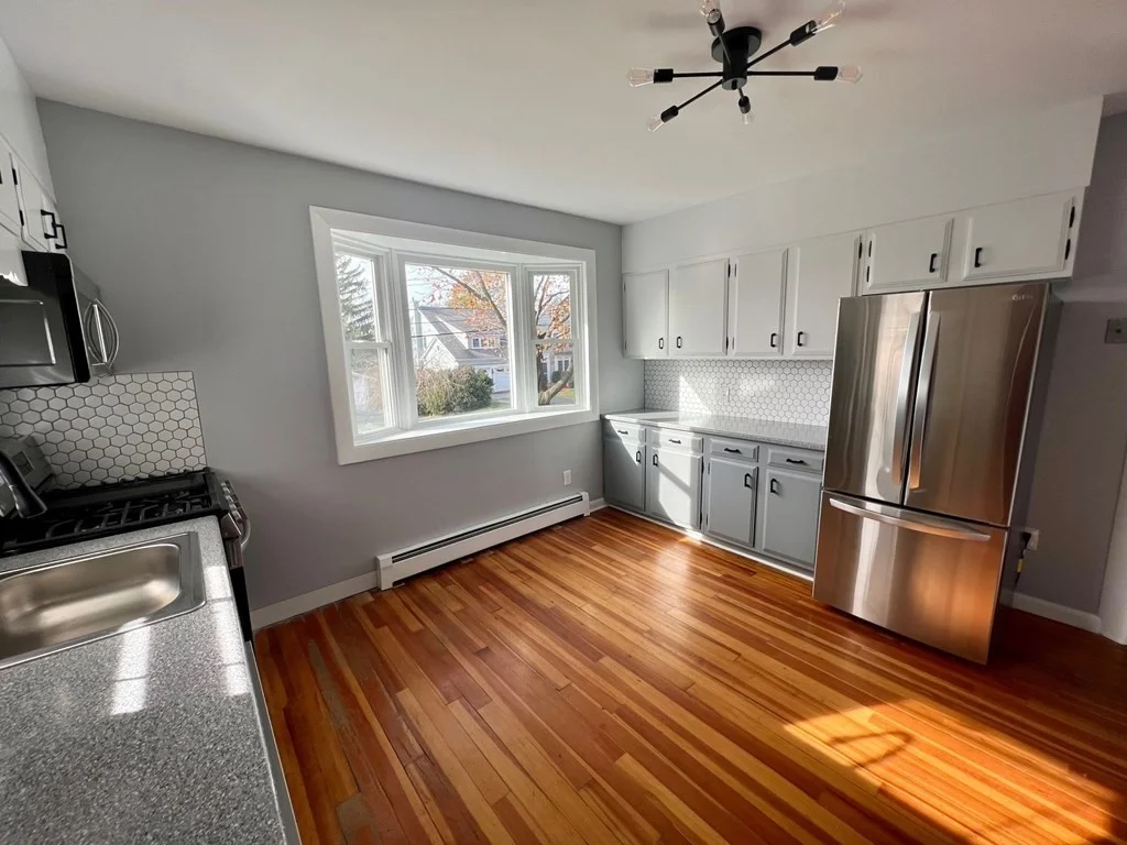 4 bed, 2 bath apartment for rent at 24 Ewell Ave Unit 24, Lexington — photo 2 of 30