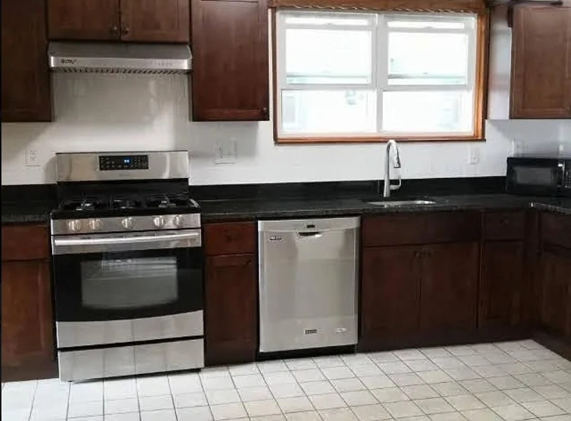 4 bed, 2 bath apartment for rent at 24 Hardwick St Unit 1, Wellington-Harrington — photo 1 of 11
