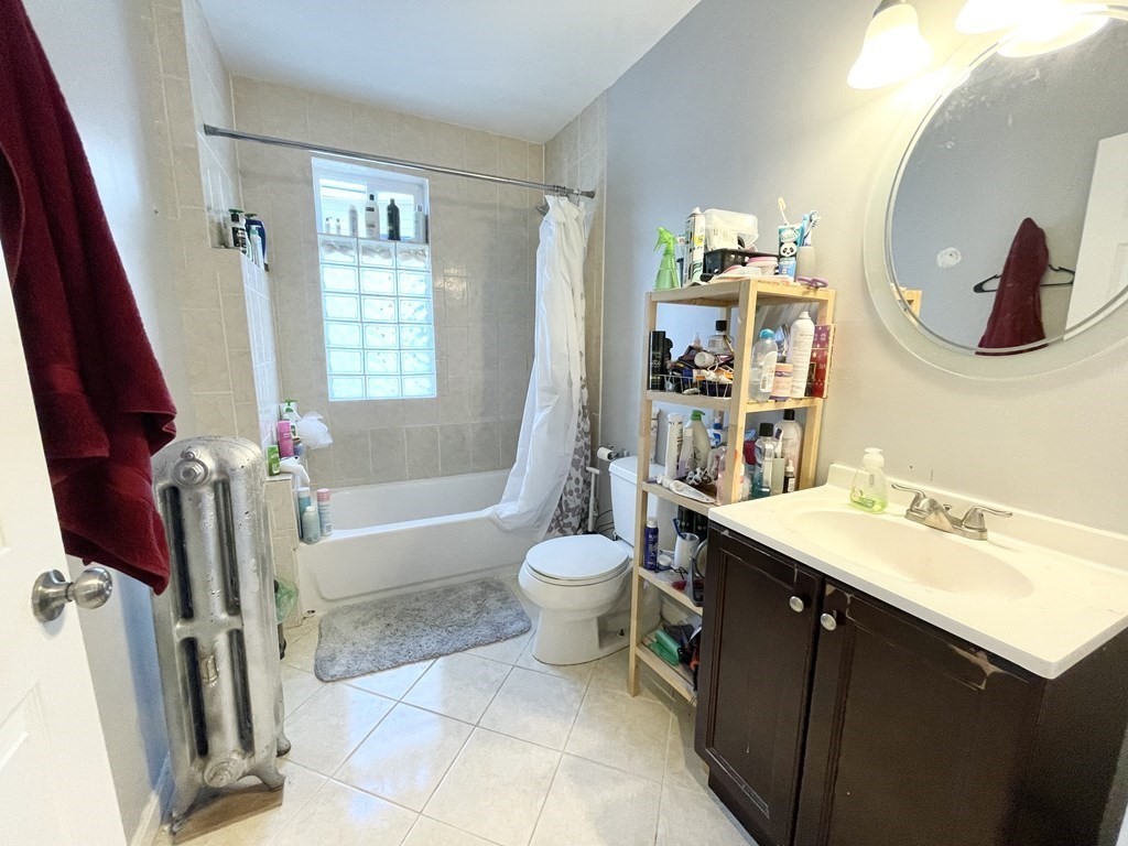 4 bed, 1 bath apartment for rent at 25 Sudan St Unit 3, Dorchester — photo 9 of 11