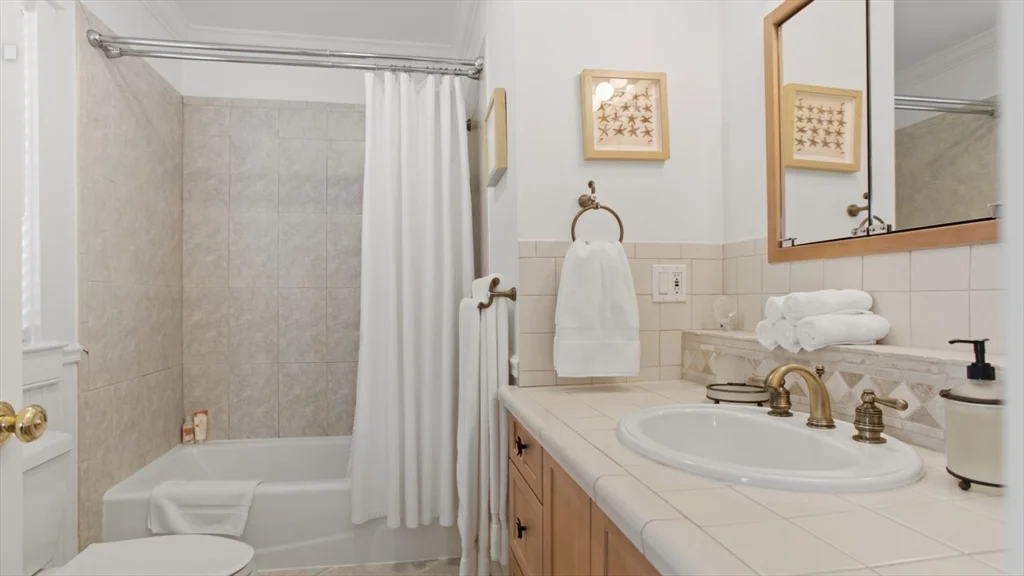 6 bed, 4+ bath apartment for rent at 26 Old Tom Nevers Unit 1, Nantucket — photo 15 of 31