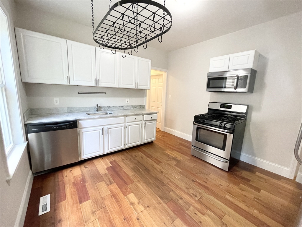 4 bed, 1 bath apartment for rent at 26 Taft Unit 1, Dorchester — photo 1 of 13